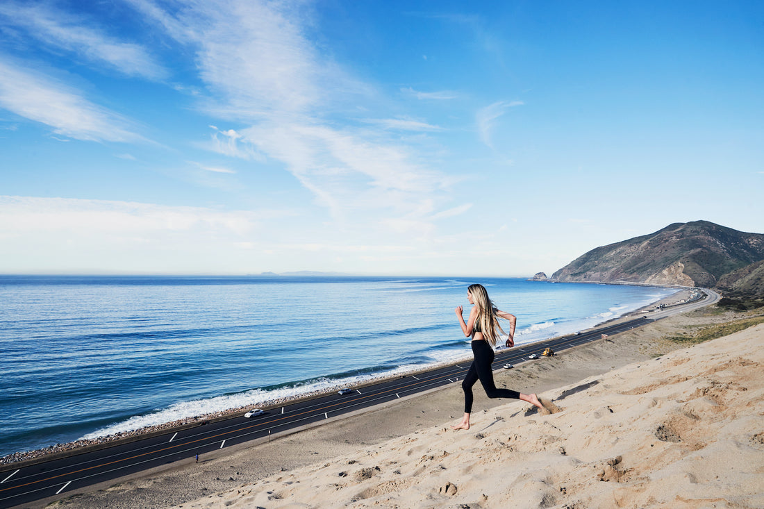 woman running on the beach