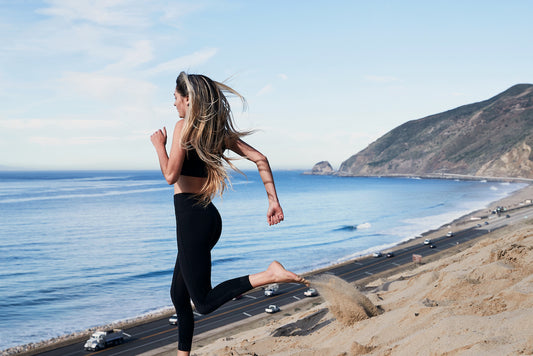 woman running on a beach