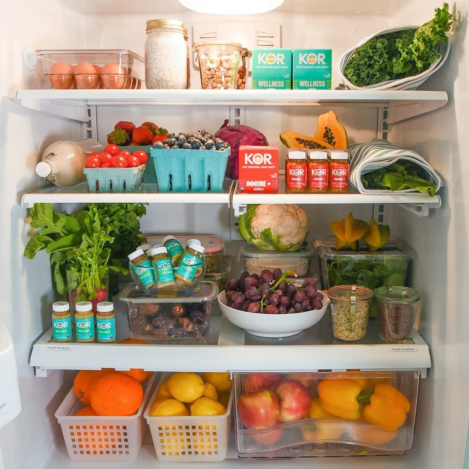 white refrigerator with healthy food 